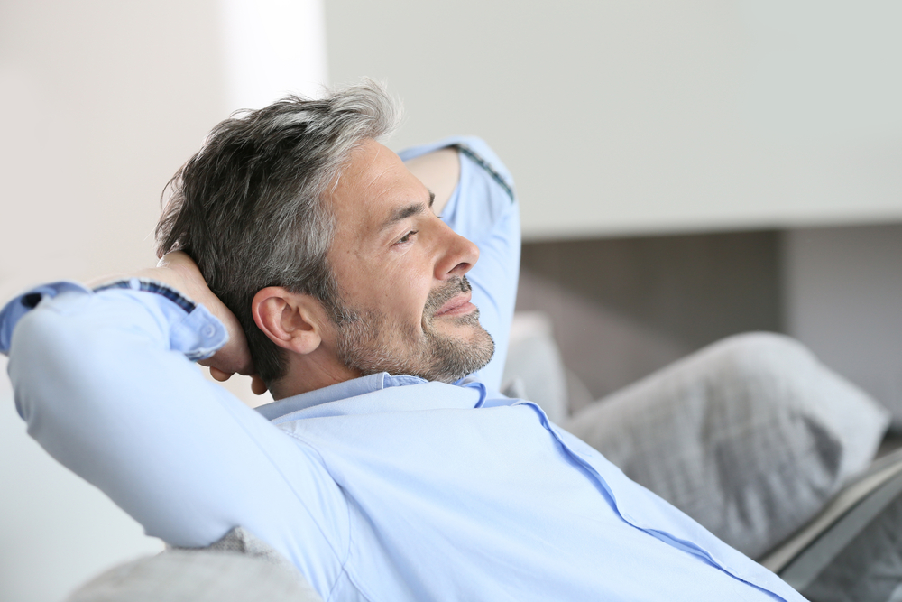 Marketing leader resting after outsourcing AI execution